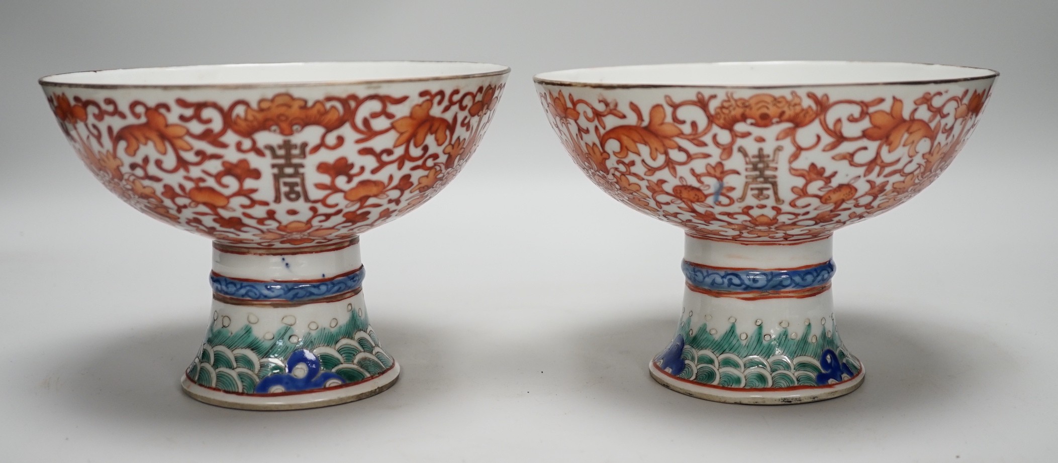 A large pair of 19th century Chinese stem bowls, painted with bats, Shou and lotus flowers, 12cm tall